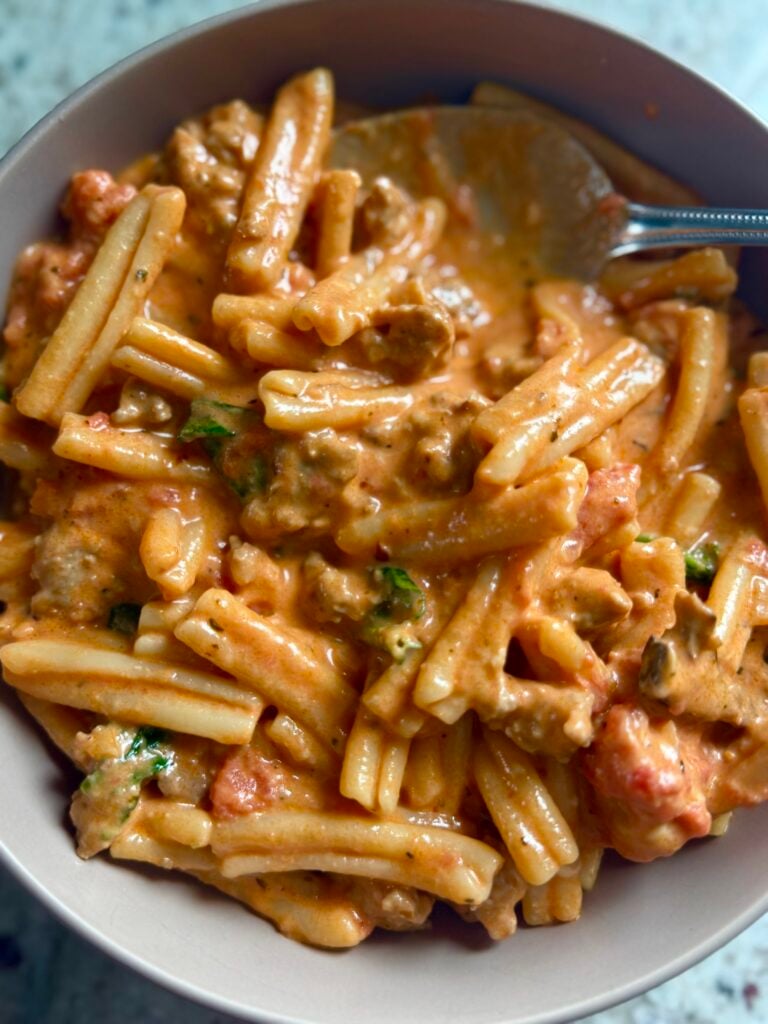 A warm bowl of creamy tomato and Italian sausage pasta