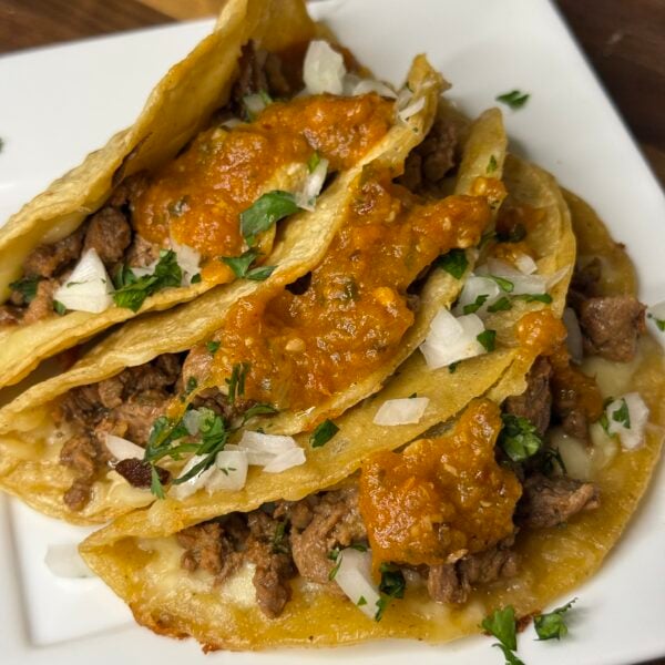 Crispy queso steak tacos