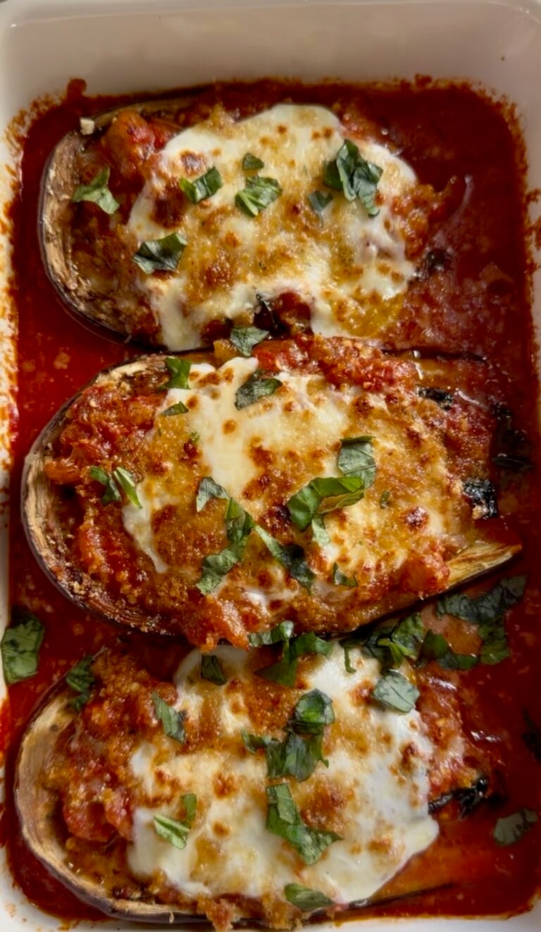Stuffed eggplant parmesan boats baked with cheese