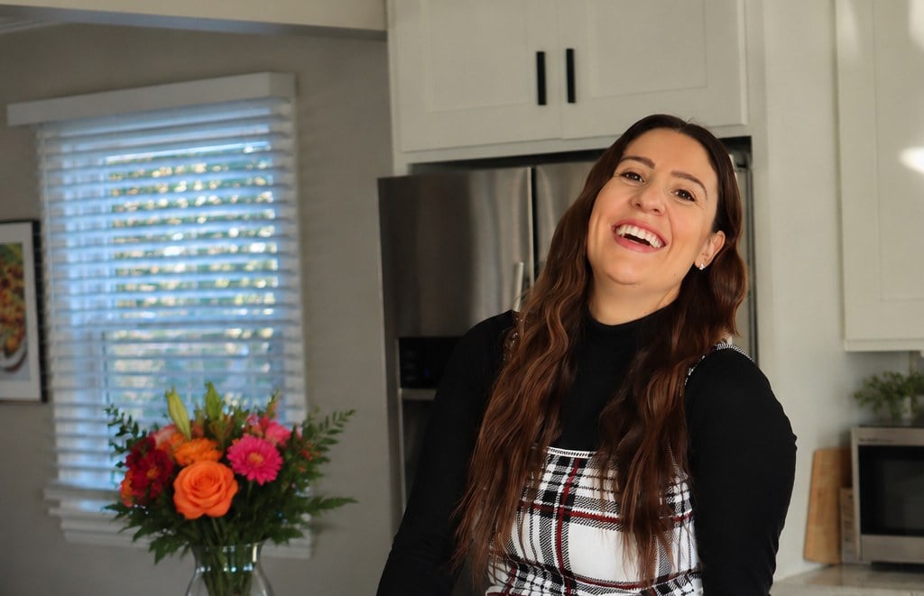 Caterina Cosentino, The Cooking Mawma, laughing in her kitchen