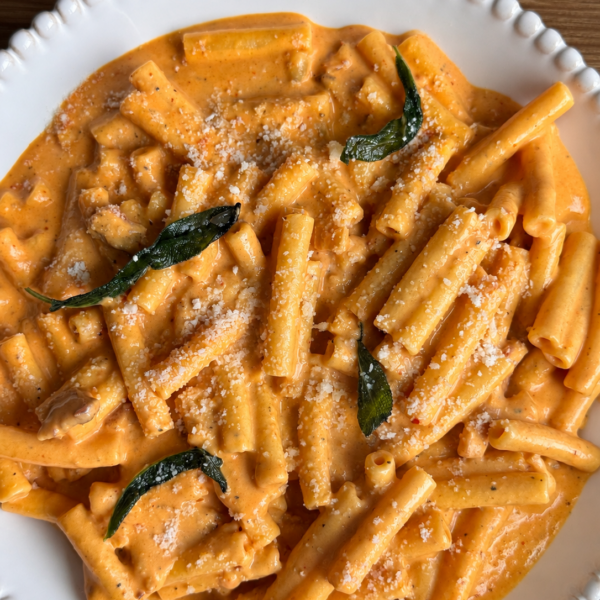 Ziti in creamy pumpkin vodka sauce with crispy sage and grated parmesan