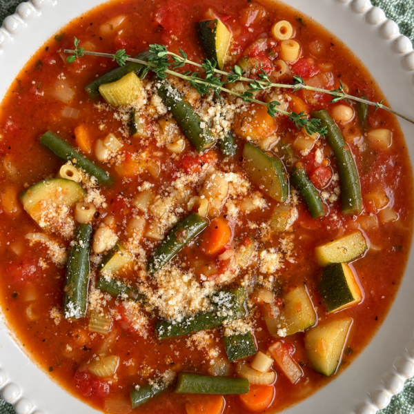 Minestrone with ditalini, green beans and zucchini under a dusting of parmesan